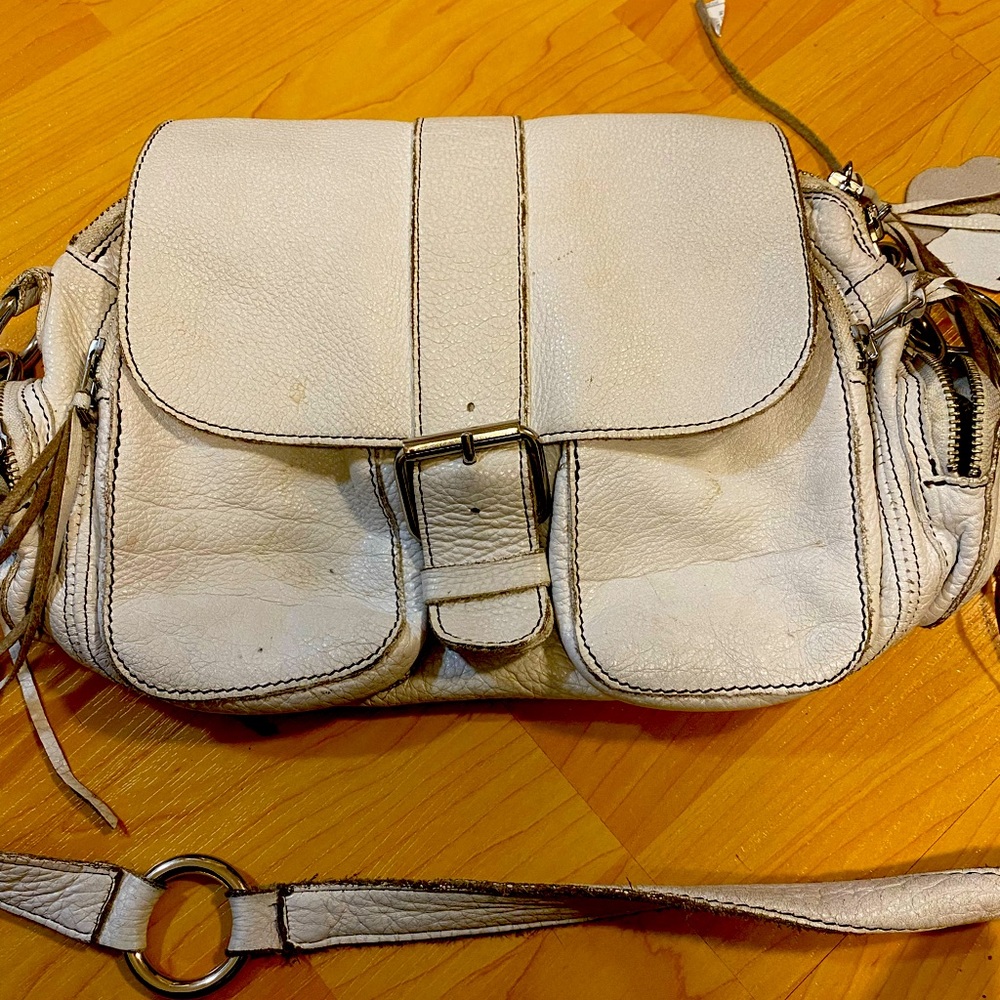 EUC Authentic Roots Leather Tassel handbag.